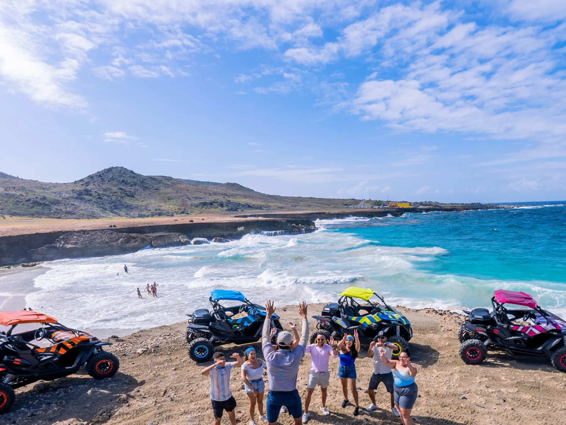 a group of people on a beach