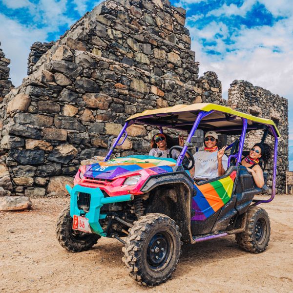a truck driving down a dirt road